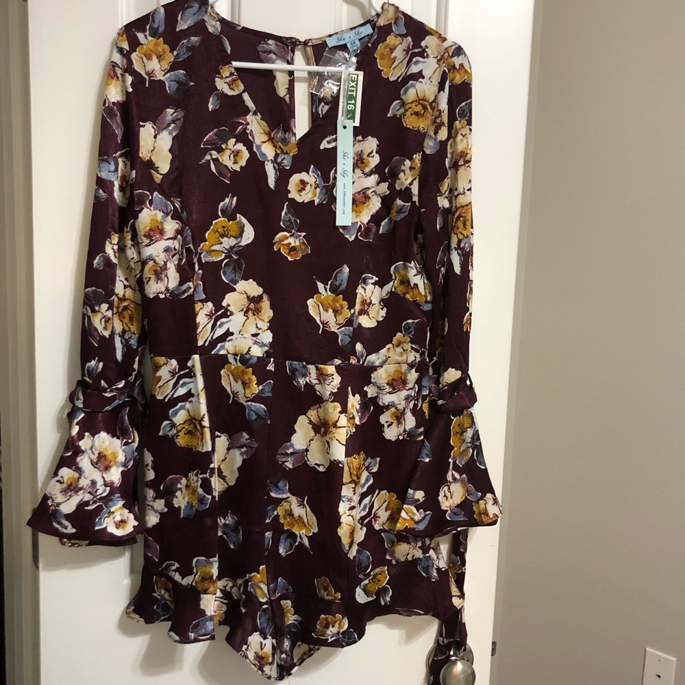 NWT long sleeve floral romper